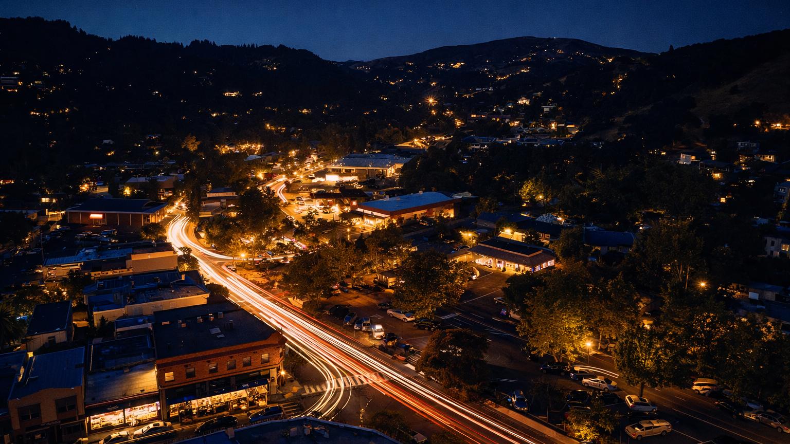 Fairfax at night from above, light trails on Sir Francis Drake and lit hillsides